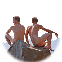 two men climb onto a big rock