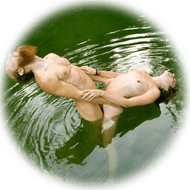 nude couple in pond